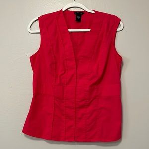 Bright pink blouse.